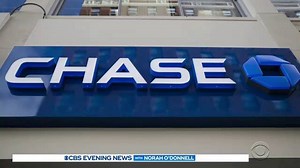 Chase Bank is getting out of the credit card business in Canada -- meaning that all Canadian customers have their debt wiped clean and ripping up customer's bills. | CBS Evening News