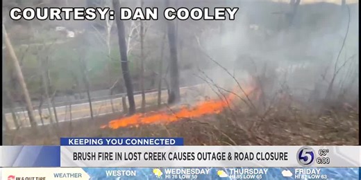 Brush fire in Lost Creek causes power outage, housefire and road closure
