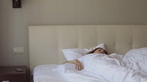 Beautiful Woman Turns Off Alarm Clock Stock Footage Video (100% Royalty-free) 33097762 | Shutterstock