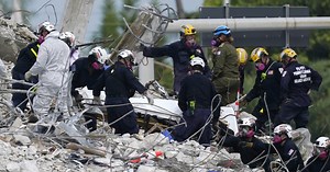 At least 94 dead in Surfside condo collapse as recovery operation continues