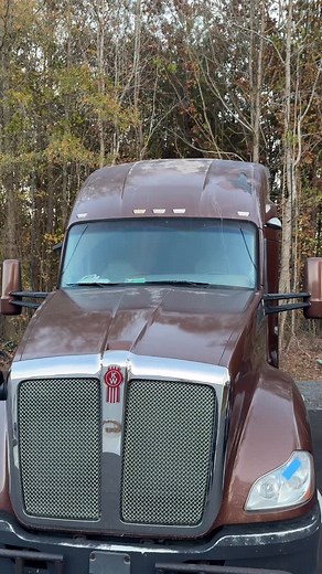 Before and after on this Kenworth T680 . Issue: Severe sun damage on roof and hood — faded, chalky paint from years of UV exposure. . Fix: Sand, Prep, Full vinyl wrap in high-gloss metallic mocha brown to restore depth, and protect from future fading! #kenworth #t680 #trucking #roofwrap #hoodwrap #inozetek #colormatch #fiberglass | PremiumFilmz