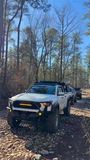 Romer Stekman on Instagram: "The perfect weather for trails ❄️🪾☀️ 25 Tacoma TRD OR Built by @konggarageusa ⚙️ @sc_led Off-Road Lights @4x4spod Switch Panel @nittotire 37s Trail Grappler @openroad_4wd 270 Awning @kustom_interior Seat Covers @kickassproducts Shower Tent @form.lighting Amber Fog Lights @relationsracewheels RS7-H +12 @goosegear 60% Rear Seat Delete @inspired_overland CarbonLite RTT @superspringsinternational Bumpstops @screenprotech Radio screen Protector @lasfit.offroad / @lasfit.