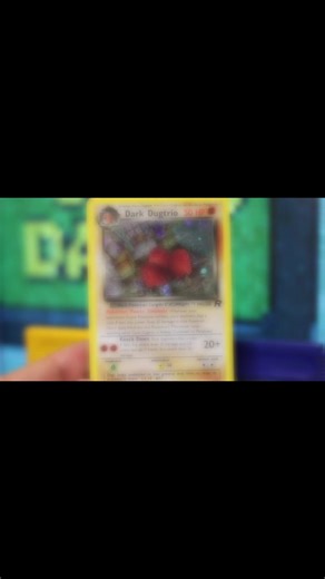 Showing off the holo that always felt underrated in the Team Rocket set. Sometimes the simplest pulls end up being the ones you come back to again and again. 🔎 Deep cut fact: Illustrated by Kagemaru Himeno, Rocket’s Dugtrio is one of the rare times this line got a darker, more expressive look in the TCG. #pokemon #pokemontiktok #pokemontcg #nostalgia #pokemoncards