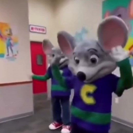 Synchronized Mouse Dance Performance in Colorful Hallway
