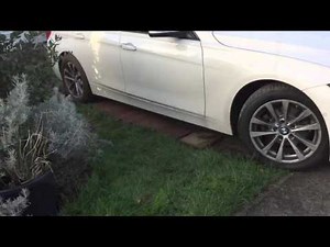 BMW rear wheel drive stuck on wet grass