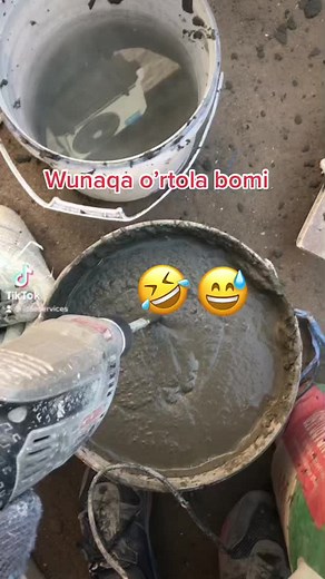 Wet Concrete Mixing Process at Construction Site