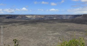 4k stationary locked off wide angle shot of Kīlauea, active shield volcano in the Hawaiian Islands that last erupted between 1983 and 2018, Kīlauea is the most active, Big Island,Hawaii,Usa
