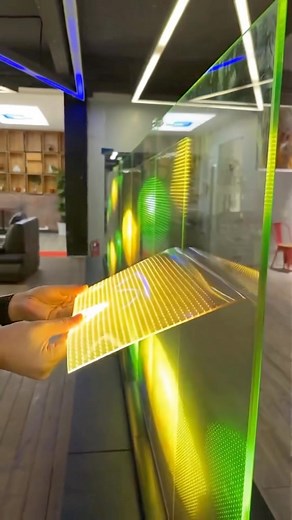 16M views · 175K reactions | Our minds are blown! This is flexible LED display film that clings to glass. Think, TV on a window. Where would you use this? Video: REEFILM Rollable LED display film. Think where uou could put this. #softdisplay #factory #factorywork #foryou #foryoupage#ledscreen #leddisplay #transparentscreen #display #led #leds #tv #hometheater #smarthome #digitalsignage #signage | Smart Home Brothers | Facebook