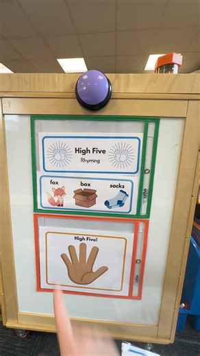 2.4K views · 20 reactions | Discover my latest teacher hack for using High Five resources more efficiently! Instead of laminating and attaching Velcro to each card, I now use Alien Tape to affix dry erase sleeves to my classroom wall. This simple change allows me to easily slide the cards in and out. Watch the video to see how I set up the High Five resources! | Preschool Vibes | Facebook