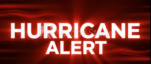 Urgent hurricane alert flashing with dramatic red light effects for news broadcasts and weather reports offering a sense of foreboding and danger