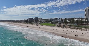Aerial View of Vibrant Beachfront City Skyline