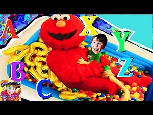 LEARNING LETTERS Show With ELMO and Surprise BALLOONS in a BALL PIT Inflatable Pool