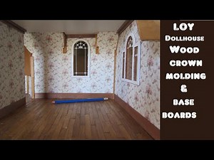 Dollhouse Bedroom gets wooden trim. Crown molding and base boards.