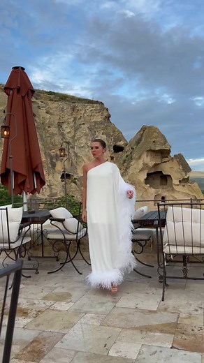 Elegant One-Shoulder Gown with Feathered Train