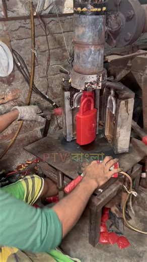 A special machine is being used to make plastic banks.