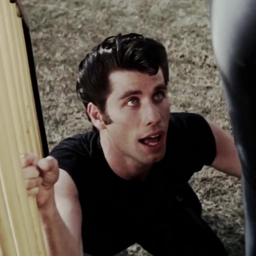 Iconic Moments from Grease Featuring Danny and Sandy
