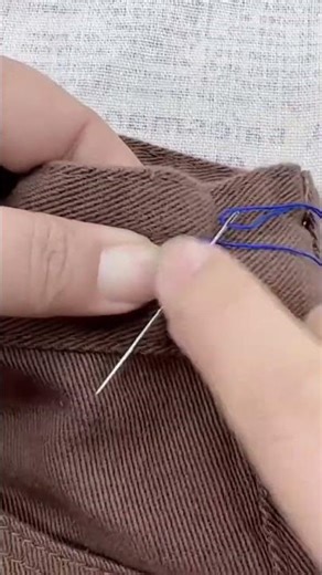 sewing on a cloth when installing a trinket is done manually #youtubeshorts
