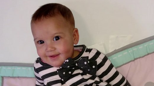 Child hears for the first time after cochlear implant surgery