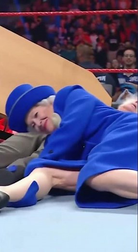 Elderly Lady in a Blue Coat Goes FULL WWE on This Old Scientist