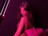 Emily Ratajkowski looks sultry in mesh dress behind the scenes of photoshoot