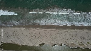 Aerial video above the coastline in the coastal town of Mancora Peru