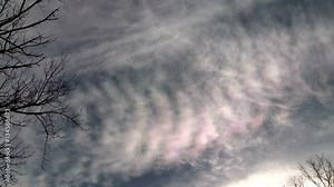 Waves in Altocumulus Clouds Drift Across Sky