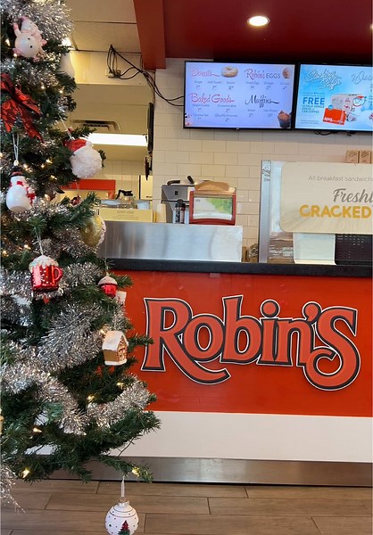The Stratford store is looking merry and bright! ❤️💚 quite in the spirit yet? A red velvet muffin or peppermint hot chocolate will have even the grinch feeling festive. Available for a limited time. 🎄 #robinsdonuts #robinsdonutspei #robinscoffee