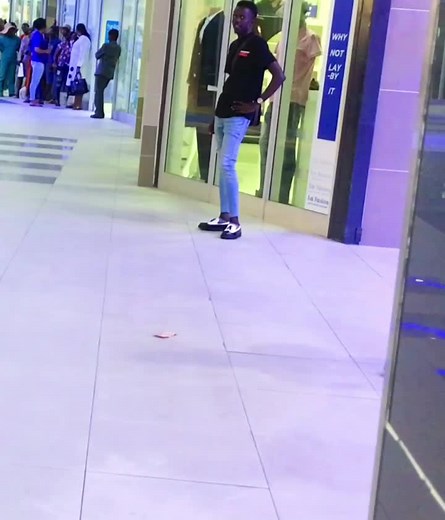 Dab Dance Moves in a Public Mall Setting