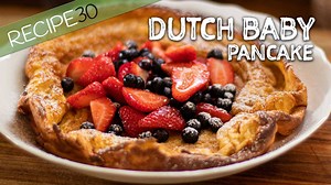 Easy Dutch Baby Pancake, a custardy puffy pancake you will love and simple to make. GET THIS RECIPE HERE www.recipe30.com A Dutch baby pancake (must be a rather big baby!) is also referred to as a German pancake. It’s traditionally baked in a cast iron pan and although spectacular out of the oven, due to its puffed-up appearance, it quickly deflates into a pancake. This recipe is easy made using a blender, but you could certainly make it using a whisk, and strain before cooking. I used berries a