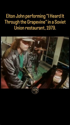 Levi Buckley on Instagram: "In 1979, Elton John became one of the first major Western rock artists to tour the Soviet Union, performing officially sanctioned concerts in Leningrad and Moscow. Footage from this visit includes an informal performance of “I Heard It Through the Grapevine” inside a Soviet restaurant, featuring Elton John and percussionist Ray Cooper. Cooper was a long-time collaborator and a prominent figure in Elton John’s live performances. The clip dates from 19 years after the l