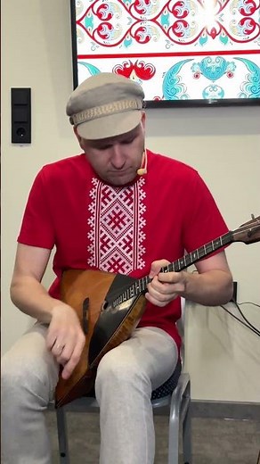 Balalaika player on a ship