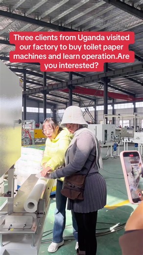 Ugandan Clients Explore Toilet Paper Machine Factory