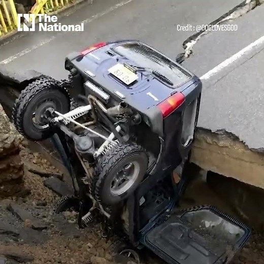 Japan floods cause roads and bridges to collapse