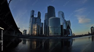 Clouds floating over skyscrapers of Moscow International Business Center (Moscow-City) and Third Ring Road at sunset. Fisheye. Time-Lapse. UHD - 4K. September 01, 2016. Moscow. Russia