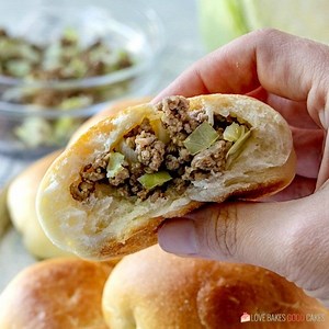 Runzas - a delicious homemade bun stuffed with ground beef, cabbage, and cheese! It's the original “Hot Pocket”. 👀 - https://www.lovebakesgoodcakes.com/runzas/ 📌 - https://www.pinterest.com/pin/235383518012131252/ | Love Bakes Good Cakes