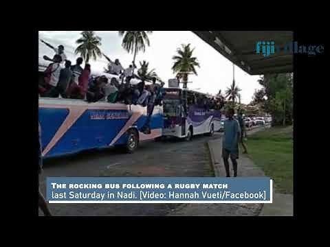 Passengers rocking a bus from side-to-side, following a rugby match