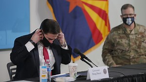 In national spotlight with COVID-19, Arizona Gov. Doug Ducey avoids aggressive response