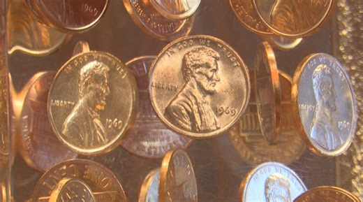 Belton coin shop owner gives advice on what to do with spare change after penny is discontinued