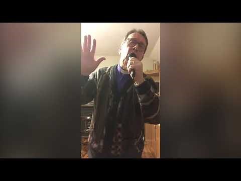 Father Ray Kelly sings You'll Never Walk Alone