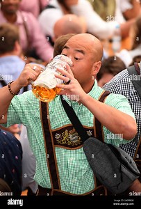Munich, Germany. 21st Sep, 2019. Start of the Oktoberfest. A guest drinks beer in the Hofbräuzelt. The largest folk festival in the world lasts until 6 October. Credit: Felix Hörhager/dpa/Alamy Live News Stock Photo - Alamy