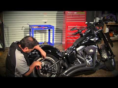How to install seat bolts on a Harley Davidson.