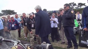 Jay Leno tests an old motorcycle at the 2014 Pebble Beach Concours d'Elegance