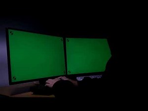 hacker using computer green screen with tracking marker