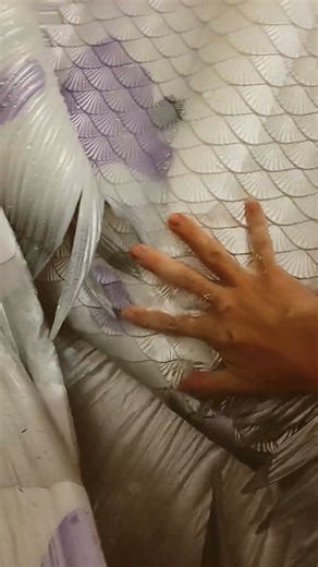 The scales of a mermaid tail (in a bathtub)