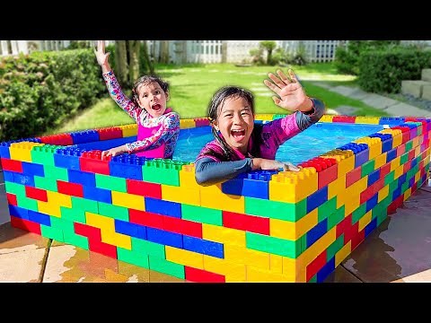 Jannie and Ellie Learn to Swim in the Kids Lego Pool and Plays with Fun Water Toys