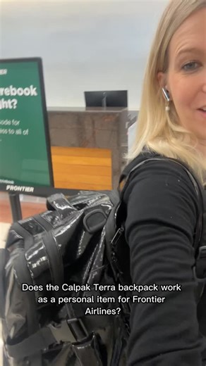 Ally | Inspiring Solo Travelers ✈️ on Instagram: "✨ Testing the CALPAK Terra duffel backpack in the Frontier Airlines personal item sizer 📏 Terra dimensions: 18″ × 12″ × 7.5″ 📐 Frontier personal item limit: 18″ × 14″ × 8″ I tested it in the Frontier personal item sizer and it is a tight fit but it does go in. The soft structure really helps here and makes it workable for Frontier as long as you do not over pack it. A great stylish option when you want something flexible and functional for pers