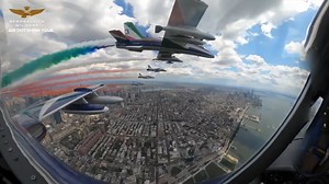 Italian Air Force jets fly over New York City in a colorful display