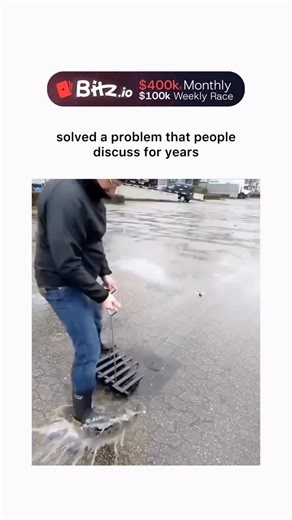 globalreel.lio on Instagram: "The video captures a man in rainy weather swiftly unclogging a storm drain in a parking lot by hooking and removing accumulated leaves and mud, restoring water flow in under a minute to avert flooding.� Posted on December 5, 2025, by @dian_arifiya� , the content emphasizes grassroots problem-solving over bureaucratic delays, amassing 1.6 million views and 3,500 likes amid debates on urban maintenance.� Replies reveal public sentiment: admiration for the initiative c