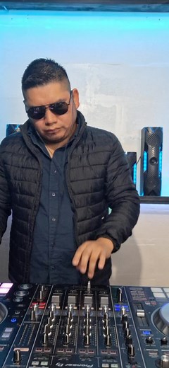 Engaging DJ Performance Behind the Mixing Console