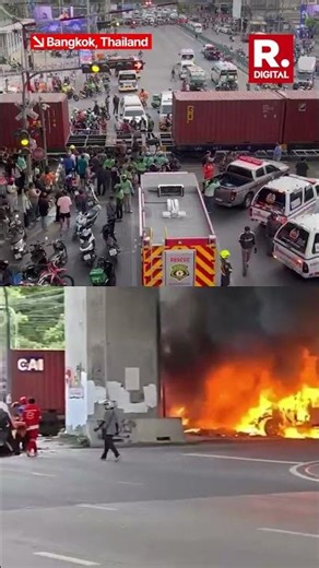 CCTV Captures Freight Train Crashing Into Bus in Bangkok